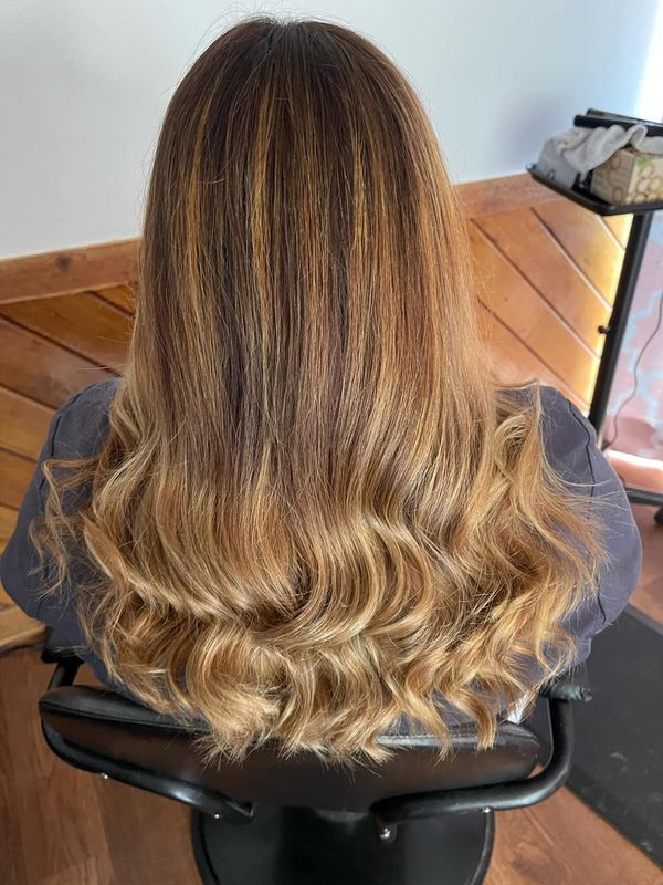 Warm honey balayage, long waves